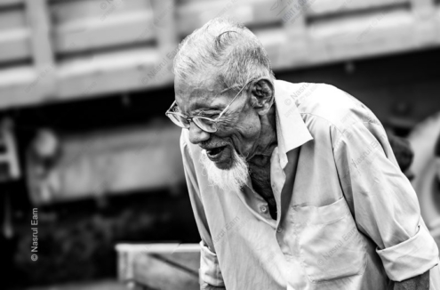 The Laughing Elder with the White Goatee