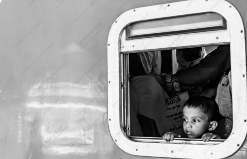 A Child's Gaze from the Train Window