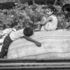 Children on a Bale by the Tracks