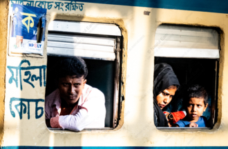 Man, Mother, and Child in Train Windows - Fine Art Photography Prints, Limited Edition Photography Art, Giclée Photography, Documentary Photography, Art Photography for Sale