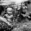 A Child's Gaze Over His Mother's Shoulder - Fine Art Photography Prints, Limited Edition Photography, Giclée Prints, High-End Photography Art, Art Photography Collectors