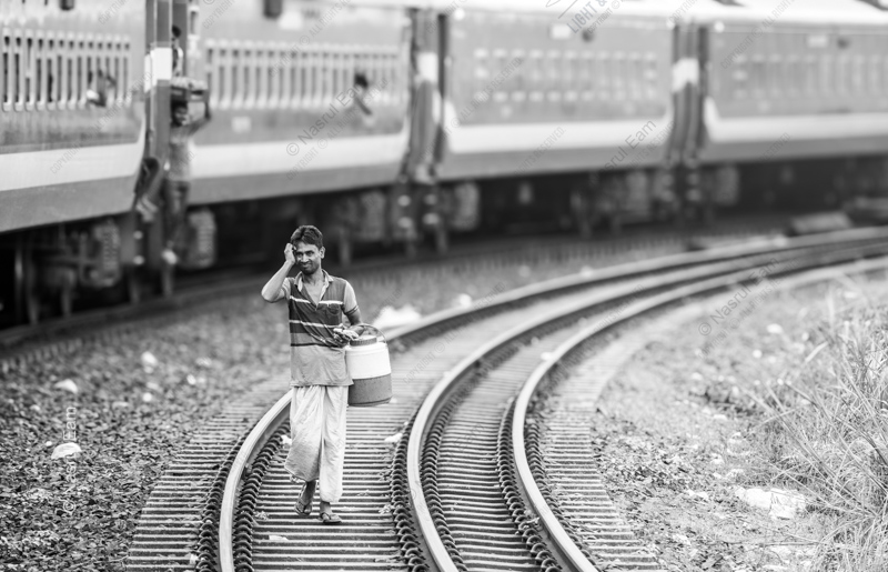 The Water Carrier on the Railway Line