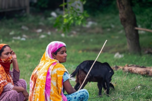 Woman with a Black Goat in a Field - Photography composition, visual storytelling photography, documentary portraiture techniques, fine art photography guide, rural life photography