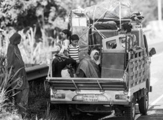 A Family's Departure from the Roadside - photography, visual storytelling, fine art photography, documentary photography, human condition
