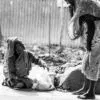 A Woman's Plea on the Pavement