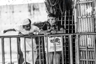 Man and Boy at the Railing
