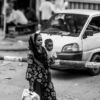 Woman and Child at the Crossing Gate