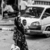 Woman and Child at the Crossing Gate