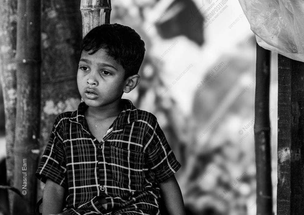 Boy by the Bamboo Post