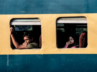 Passengers in Teal and Gold