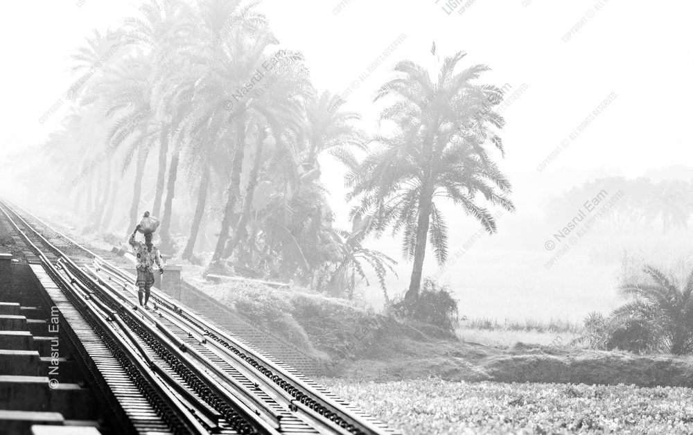 A Figure on the Railway Through the Mist