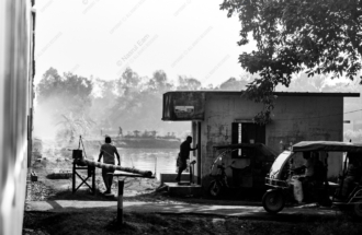 Figures at the River Crossing in Morning Light