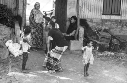 A Young Girl Dances in the Courtyard