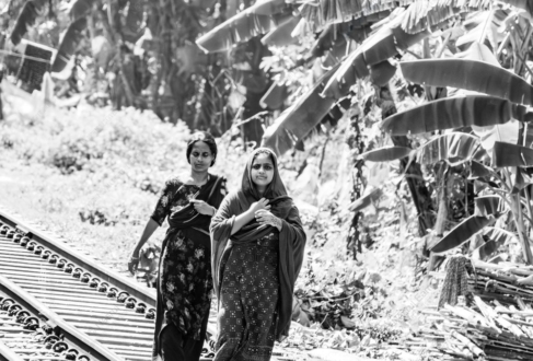 Two Women Walking the Railway Line
