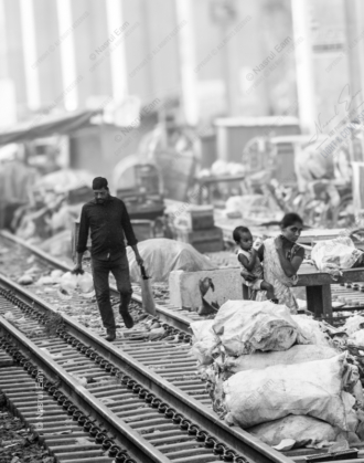 A Family Along the Tracks
