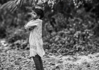 Young Boy on Stony Ground