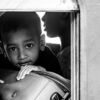 Young Traveler by the Window