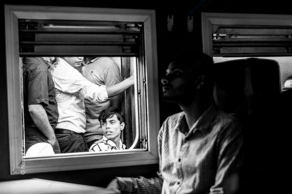 The Boy in the Carriage Window