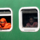 Woman in Orange and Girl in the Window nasrul eam 20251021 Dhaka Rajshahi Tour 20 21 EN1 5297