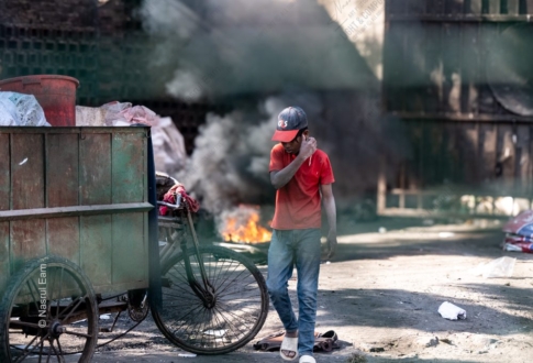 A Young Man's Moment by the Burning Debris