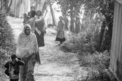 A Procession of Travelers on a Dusty Path