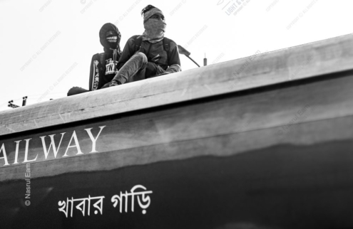 Travelers Atop the Moving Carriage