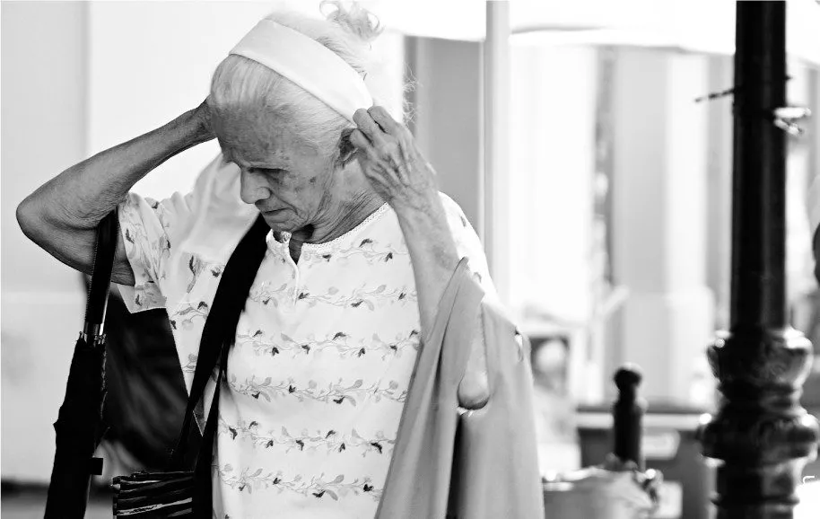 An Elderly Woman in the Old San Juan by Jose Juniel Rivera-Negron